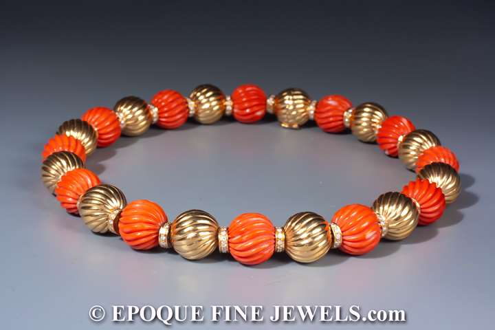 An impressive gold, coral and diamond necklace
